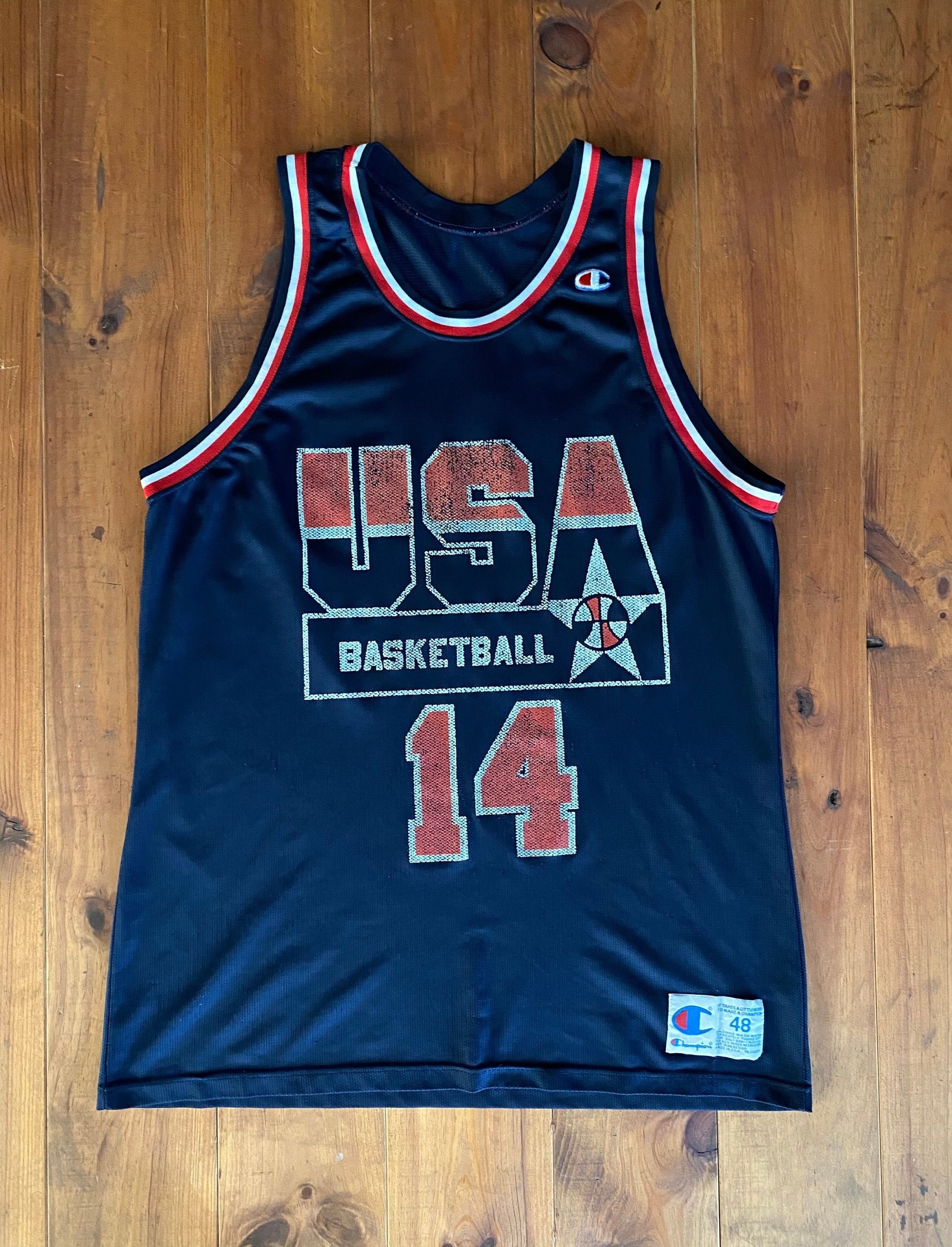 Vintage distressed 90s USA Team Champion NBA jersey with player Mourning #14, size 48 - front view.