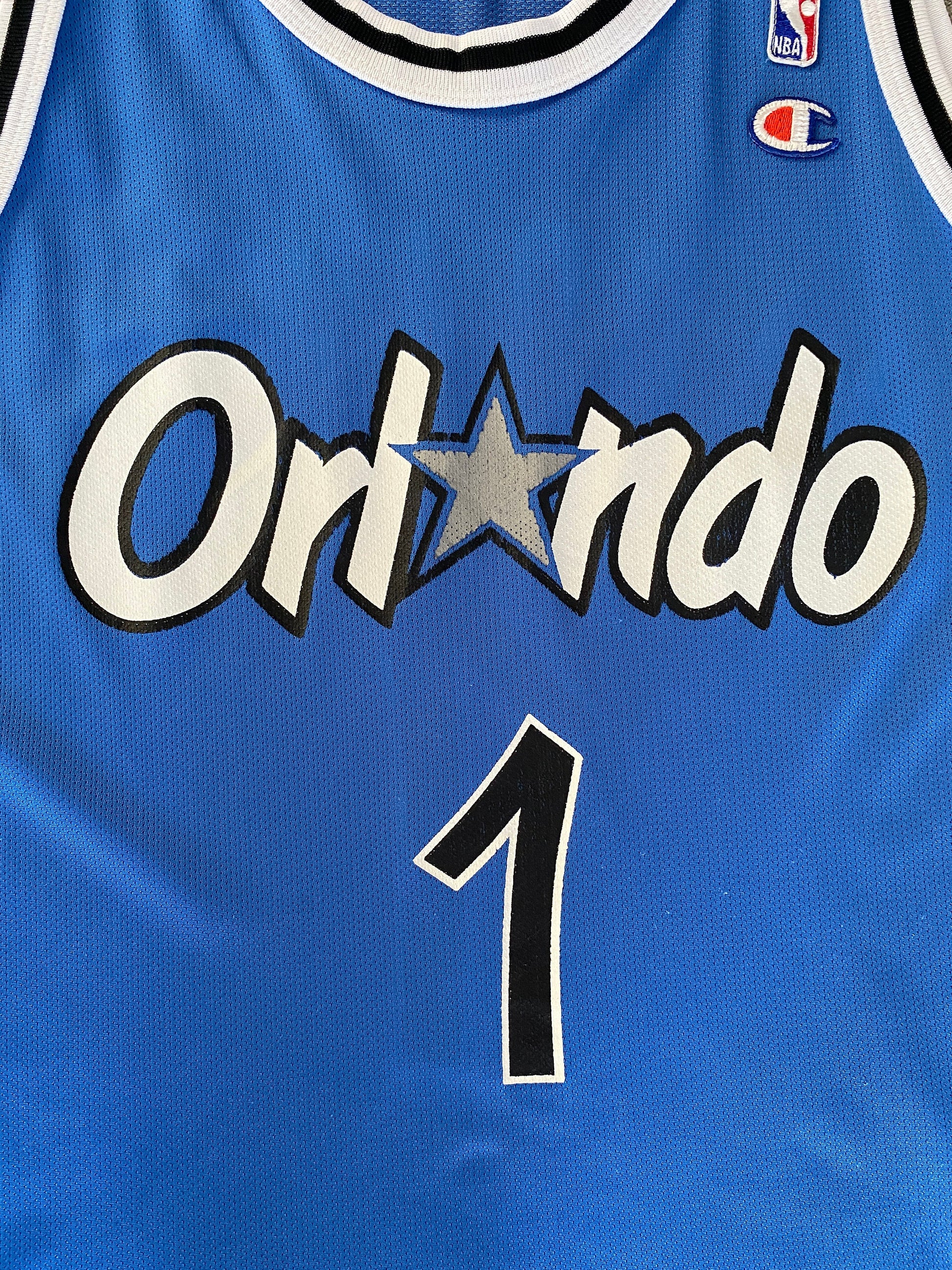 Vintage 90s Champion NBA jersey with player Hardaway #1, size 44 - front view, Orlando Magic. Made in USA.