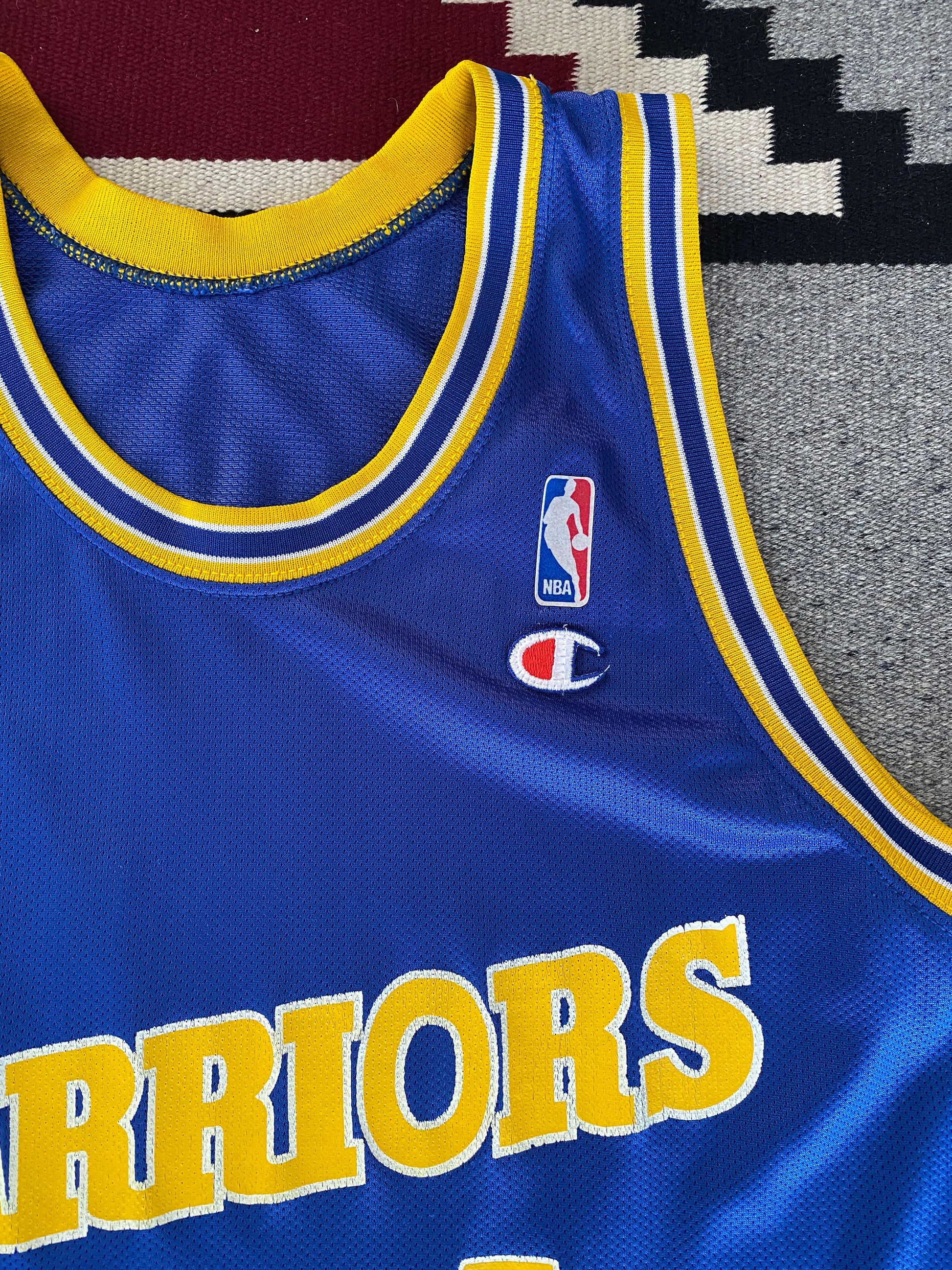 Vintage 90s Champion NBA jersey with player Webber #17, size 44 - front view, Golden State Warriors. Made in USA.