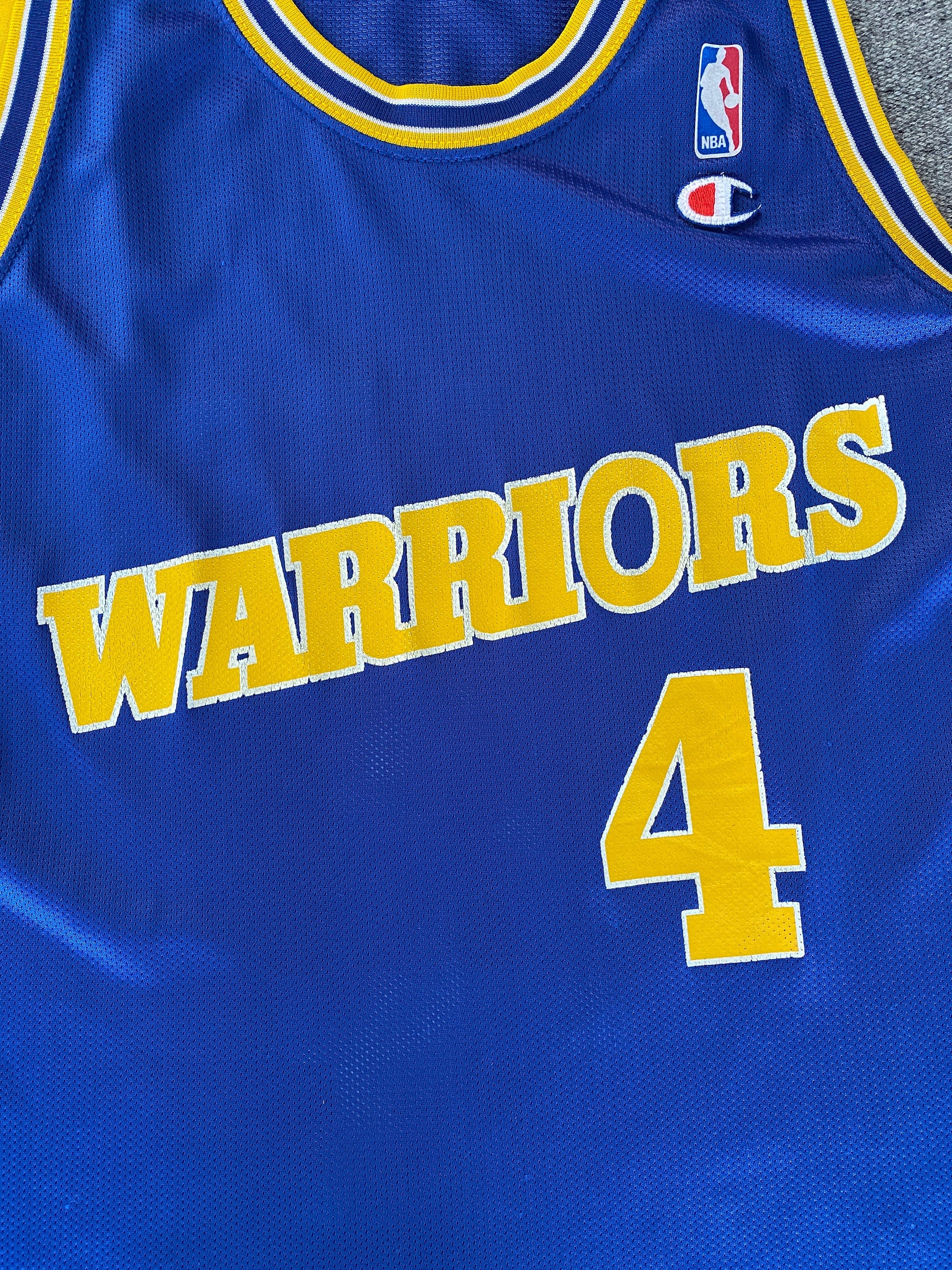 Vintage 90s Champion NBA jersey with player Webber #17, size 44 - front view, Golden State Warriors. Made in USA.