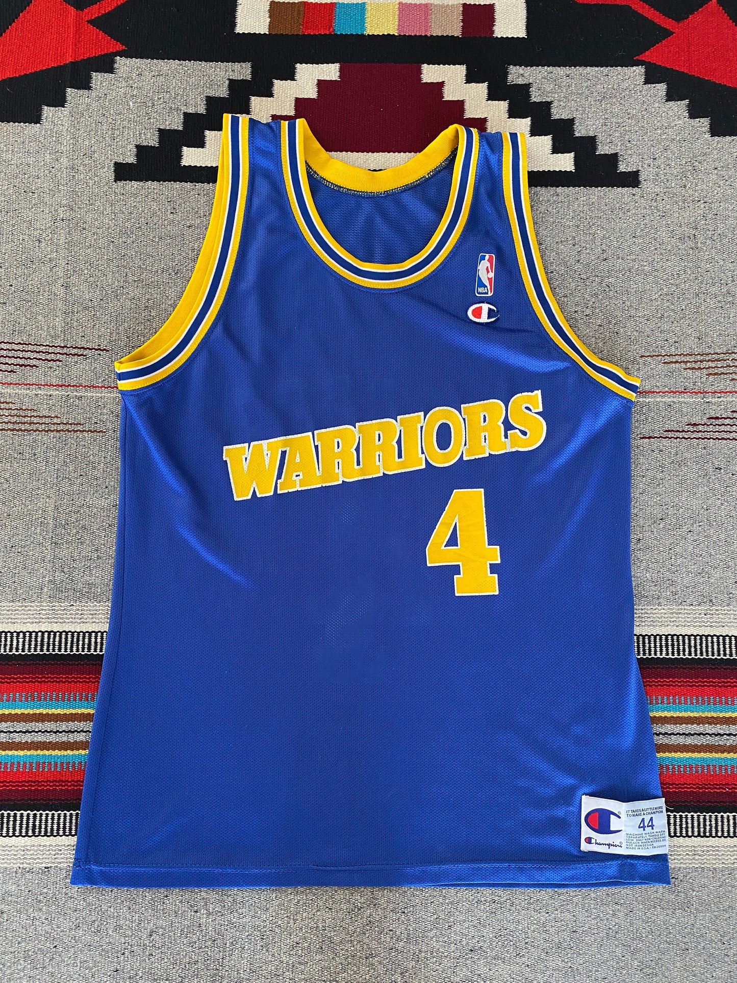 Vintage 90s Champion NBA jersey with player Webber #17, size 44 - front view, Golden State Warriors. Made in USA.