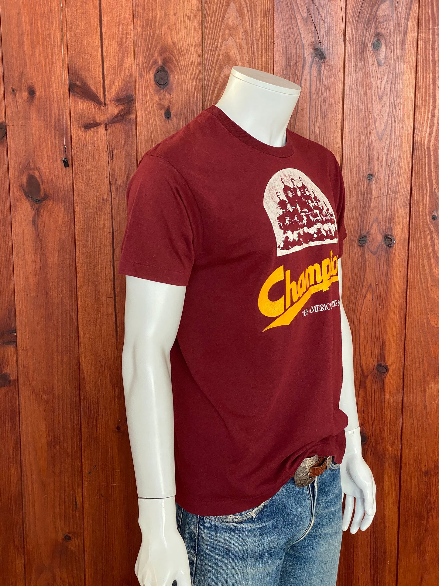 Large. Vintage 50/50 cotton 80s Champions Sports Bar  t shirt Made In USA