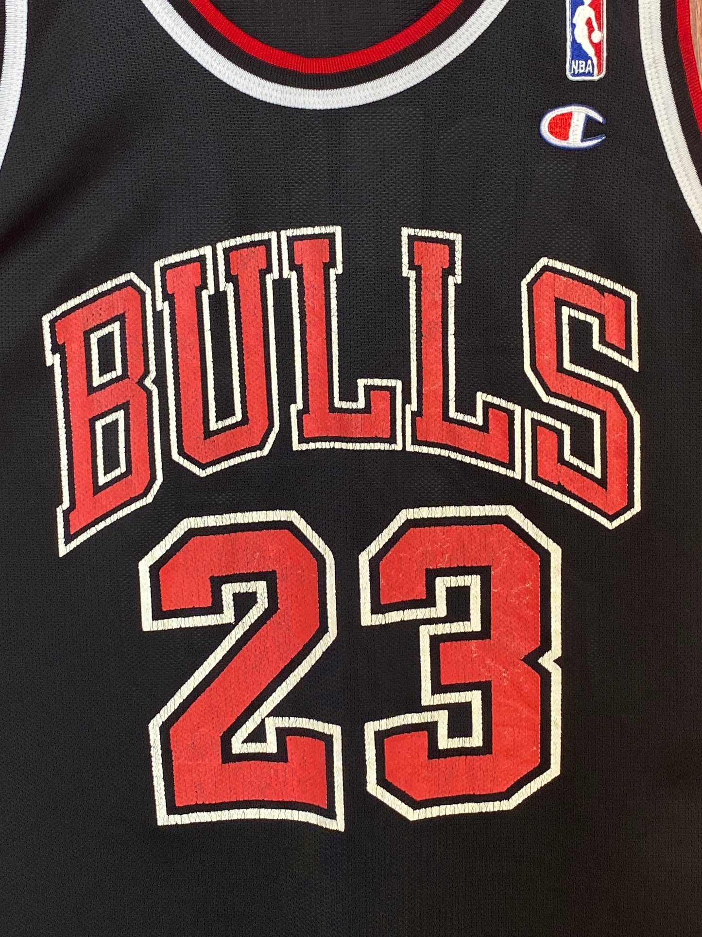 Vintage 90s Chicago Bulls Michael Jordan #23 NBA jersey, size 44 - front view.