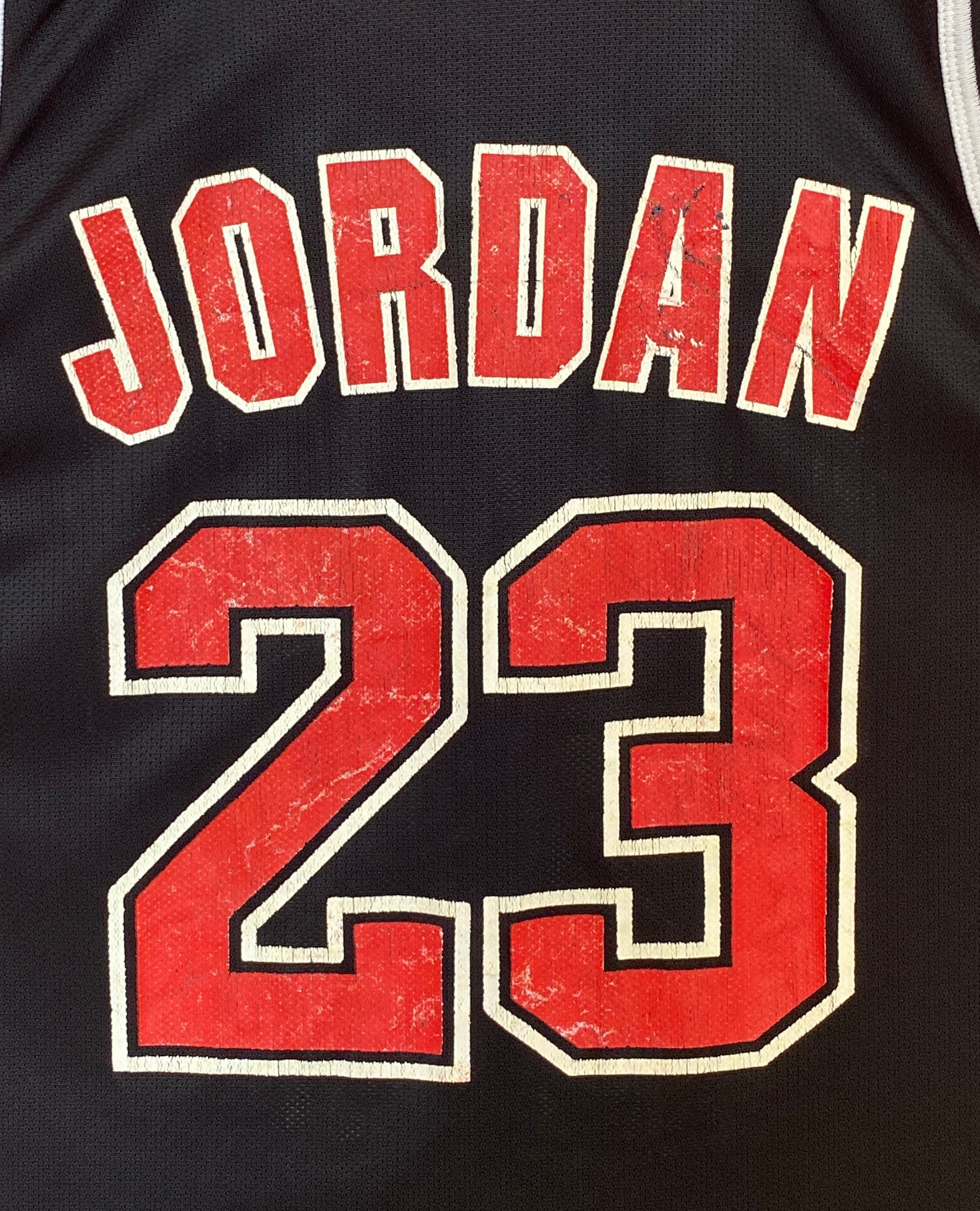 Vintage 90s Chicago Bulls Michael Jordan #23 NBA jersey, size 44 - back view.