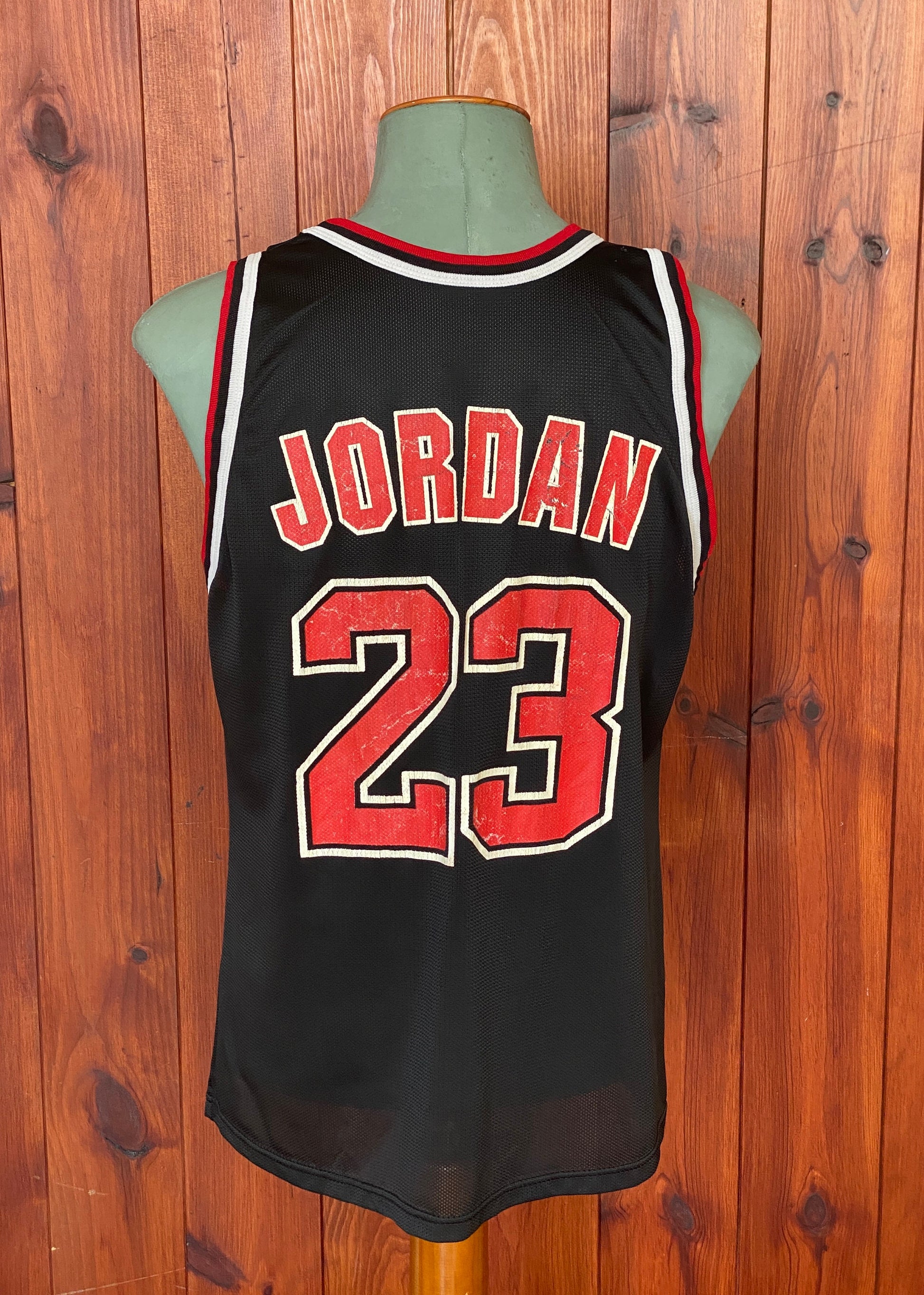 Vintage 90s Chicago Bulls Michael Jordan #23 NBA jersey, size 44 - back view.