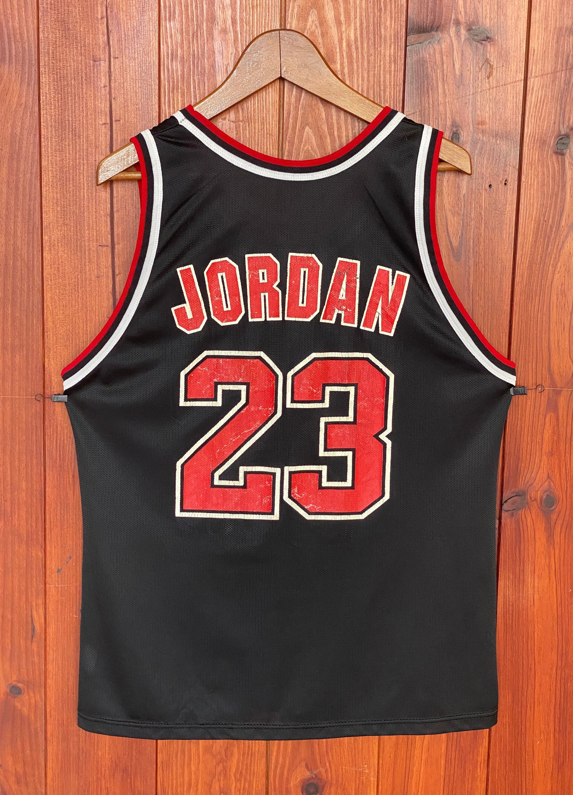 Vintage 90s Chicago Bulls Michael Jordan #23 NBA jersey, size 44 - back view.