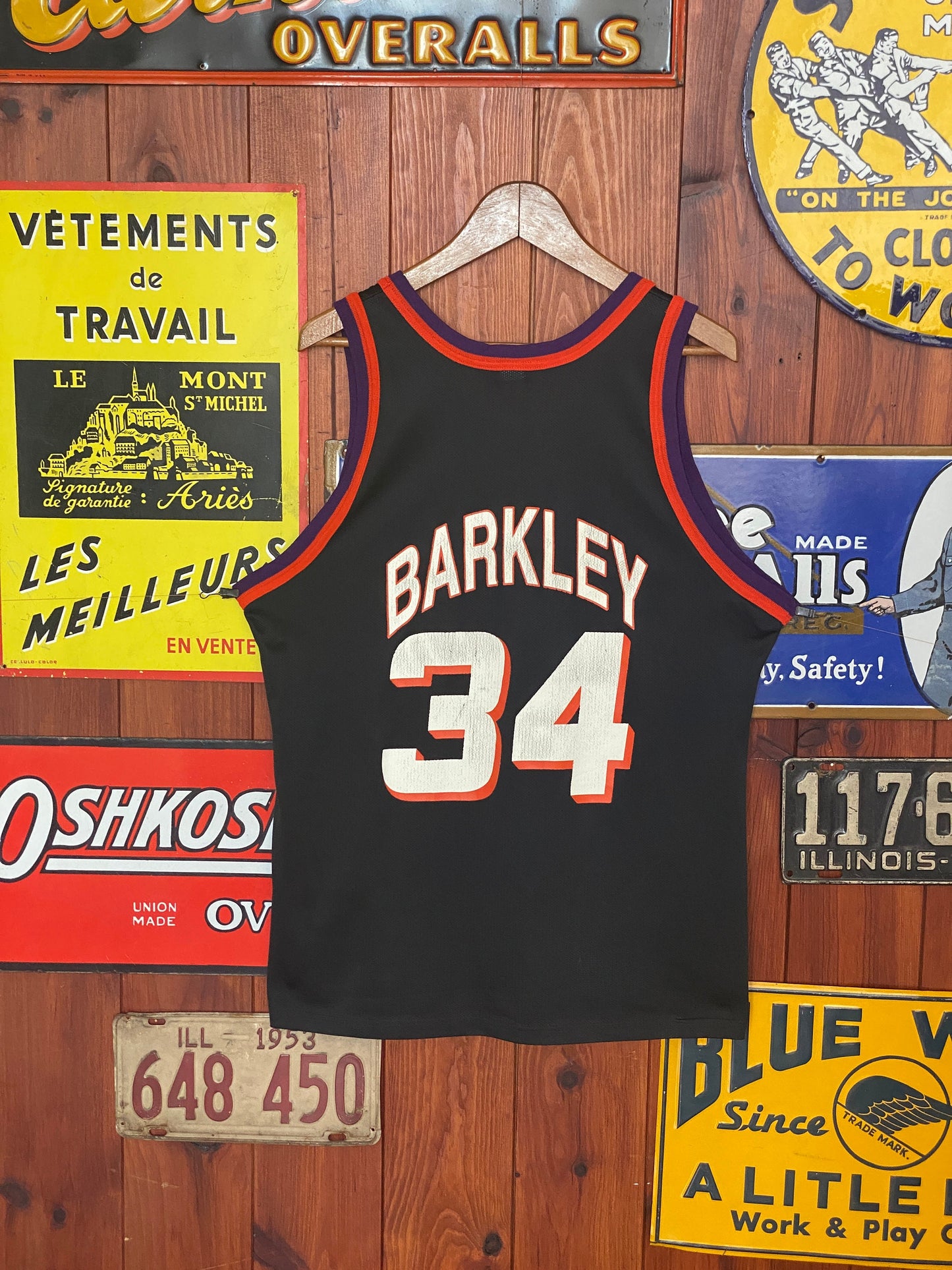 Vintage 90s NBA Phoenix Suns Charles Barkley #34 jersey, size 44 - back view. Made by Champion.