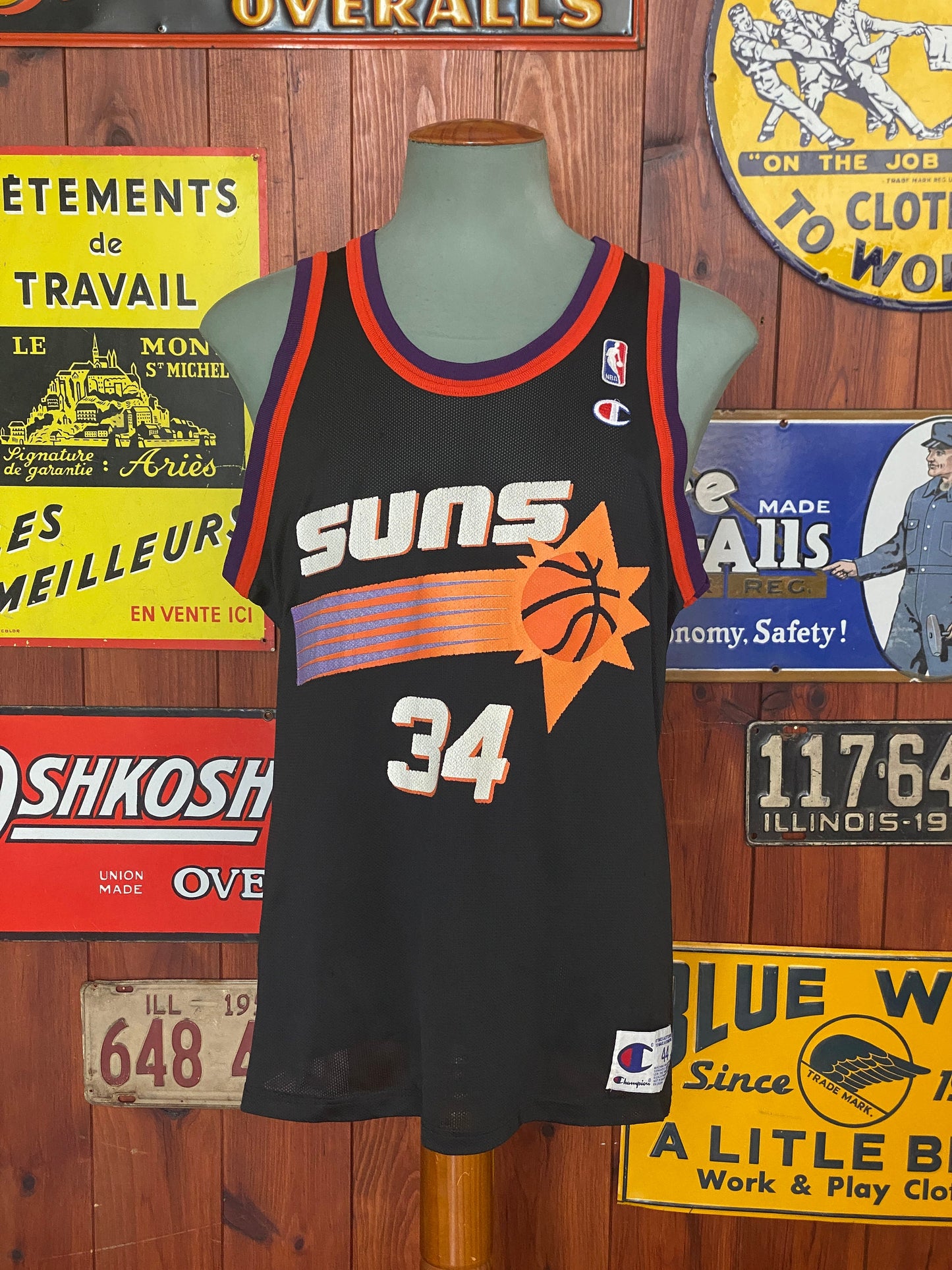 Vintage 90s NBA Phoenix Suns Charles Barkley #34 jersey, size 44 - front view. Made by Champion.