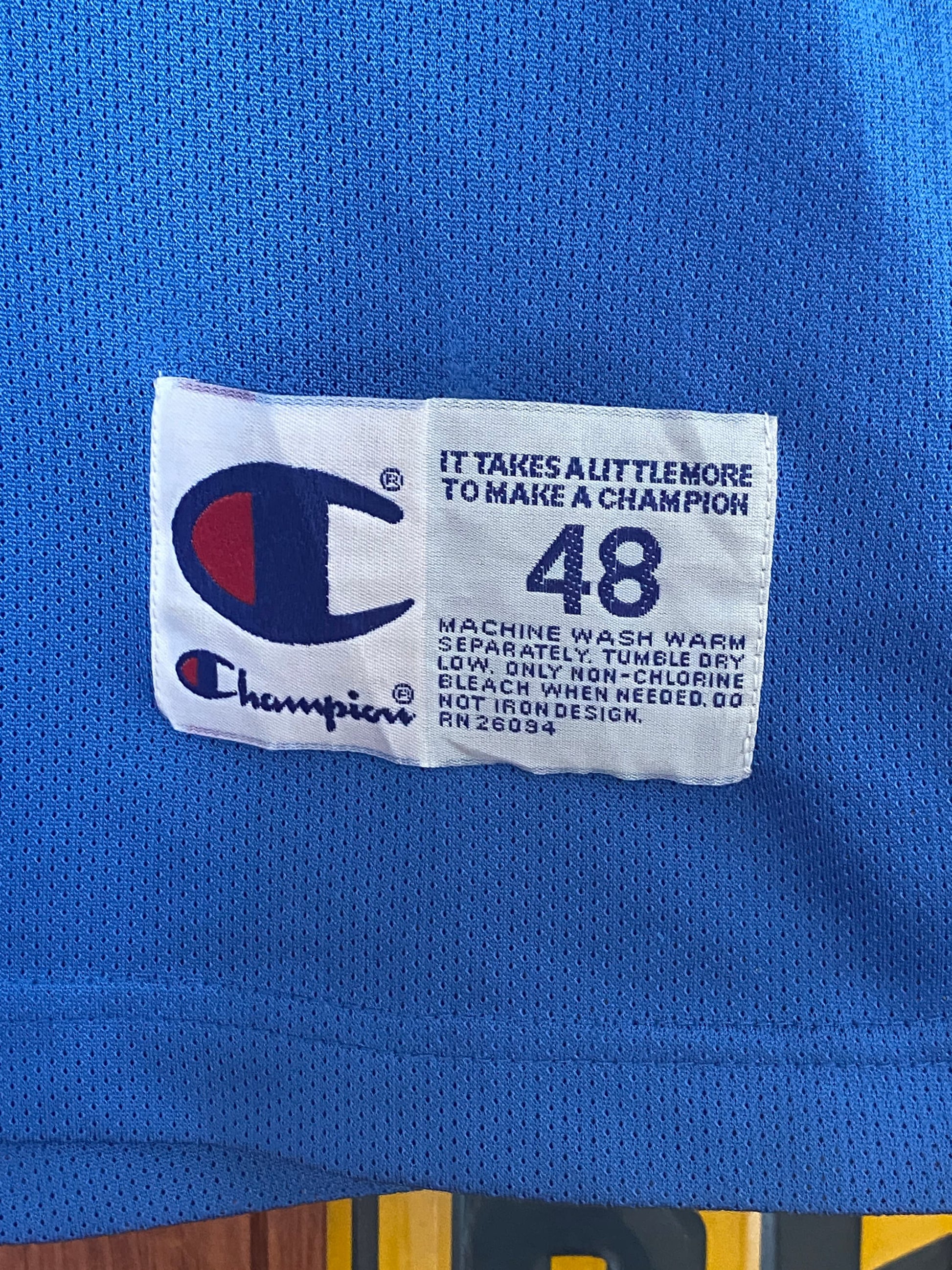 Vintage 90s Orlando NBA jersey with player O'Neal #32, size 48 - front view. Made by Champion.