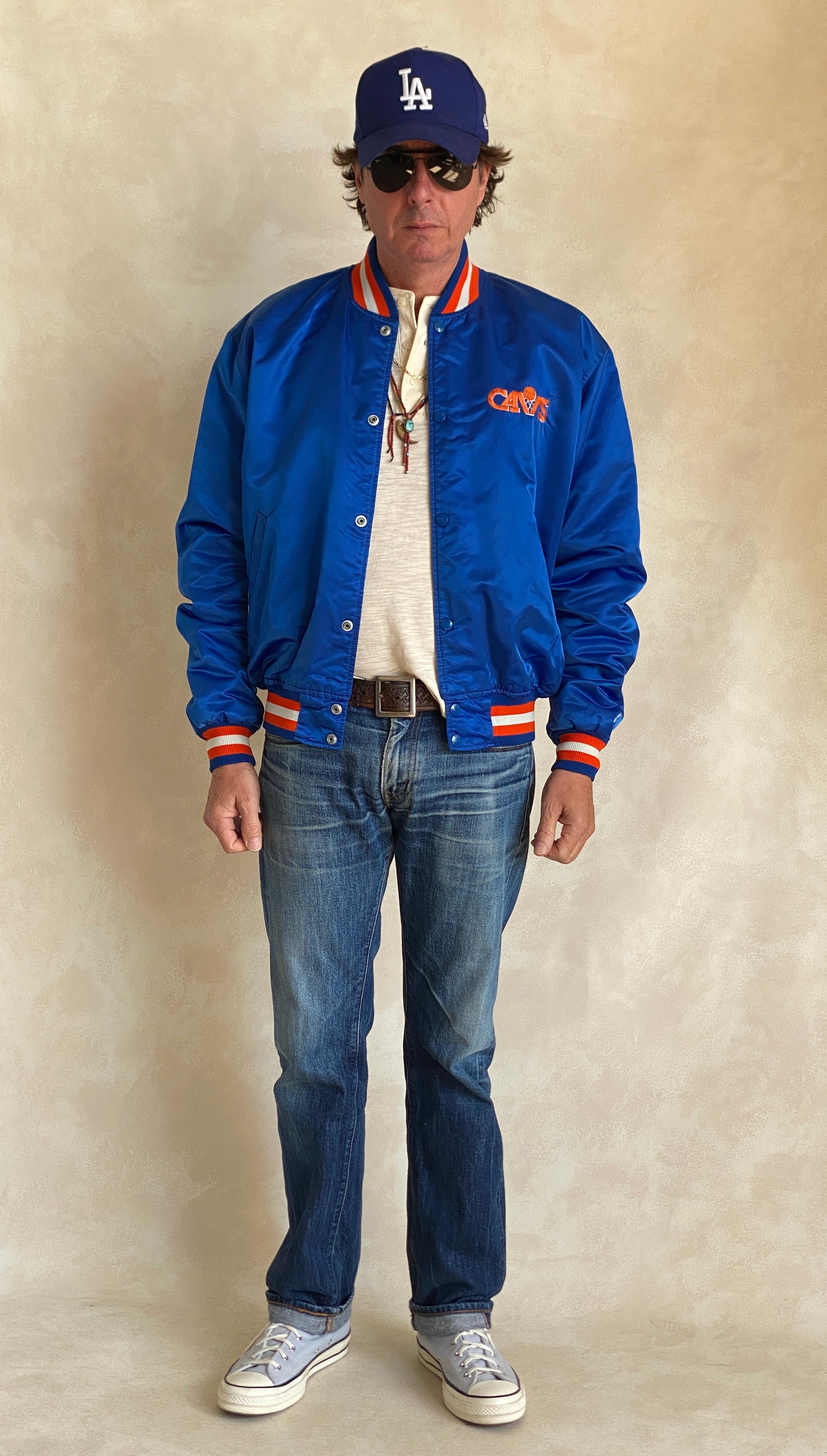 Vintage 1980s Cleveland Cavaliers Starter satin jacket with retro logo and bold team colors, size XL