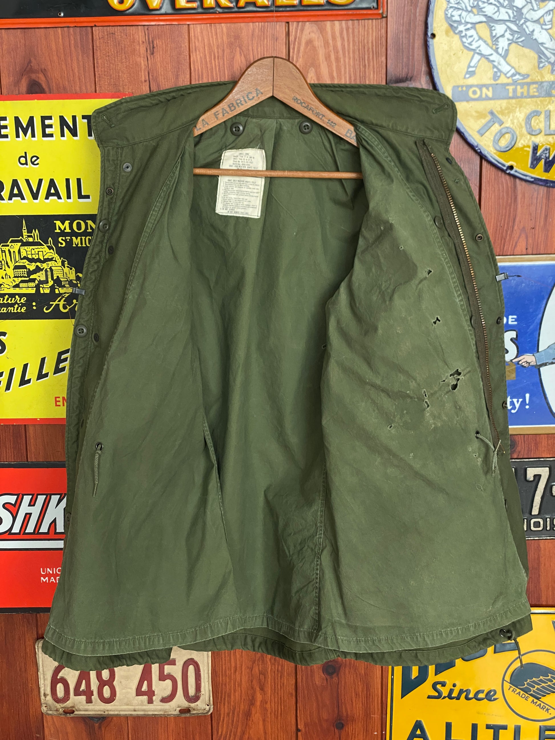Vintage 1972 Vietnam War era US Army M-65 OG-107 field jacket, size Small.