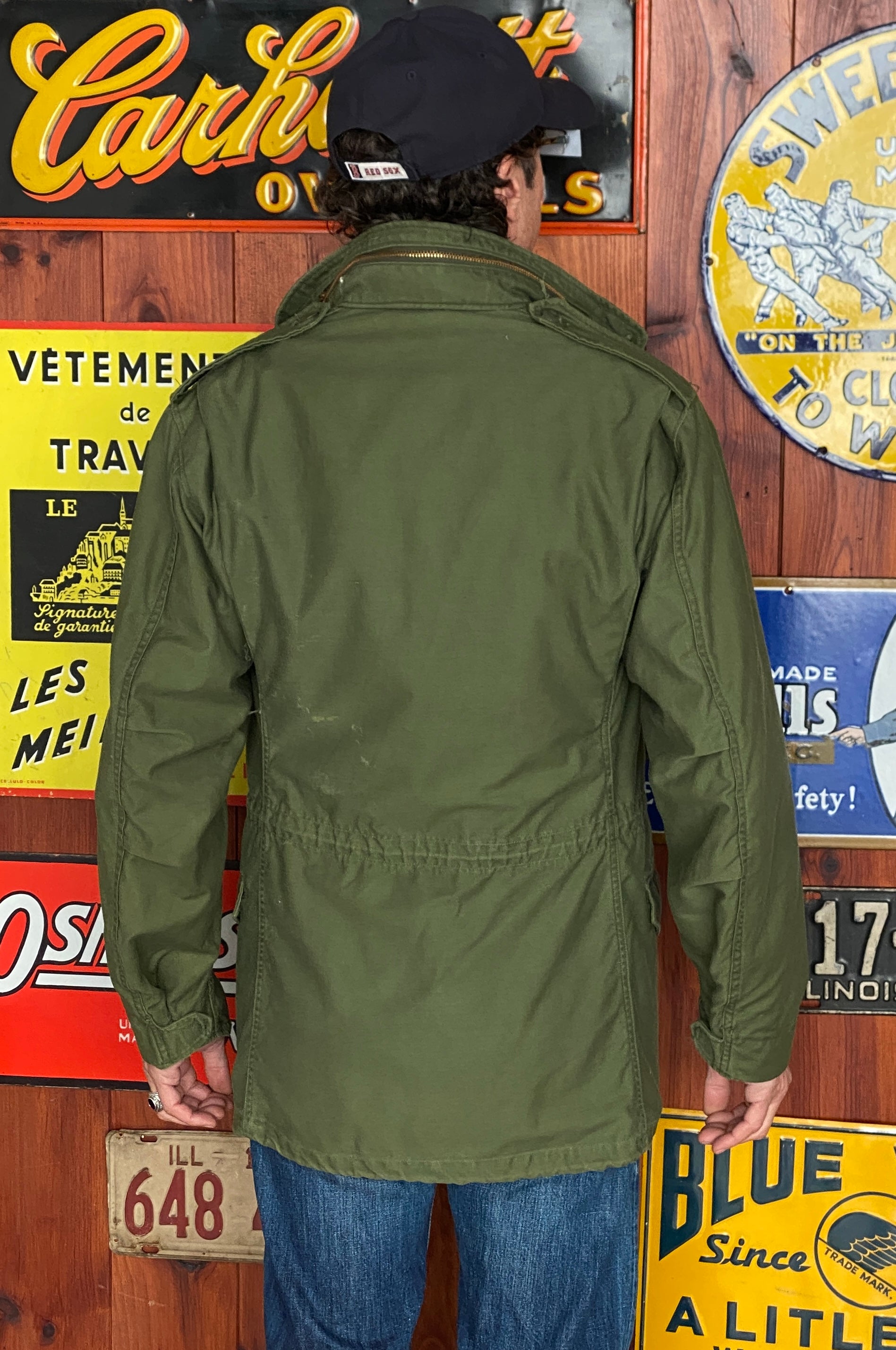 Vintage 1972 Vietnam War era US Army M-65 OG-107 field jacket, size Small.