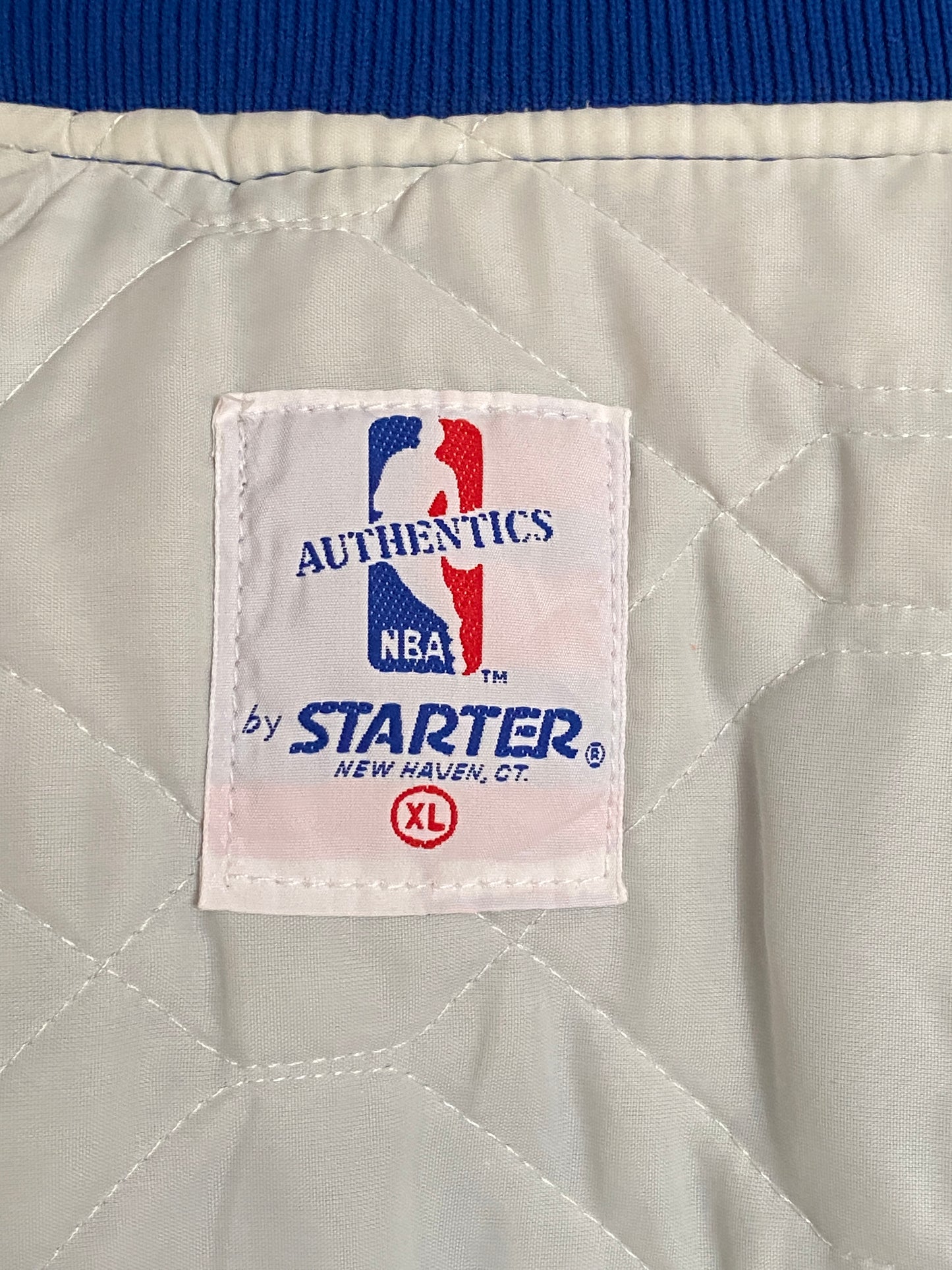 Vintage 1980s Cleveland Cavaliers Starter satin jacket with retro logo and bold team colors, size XL