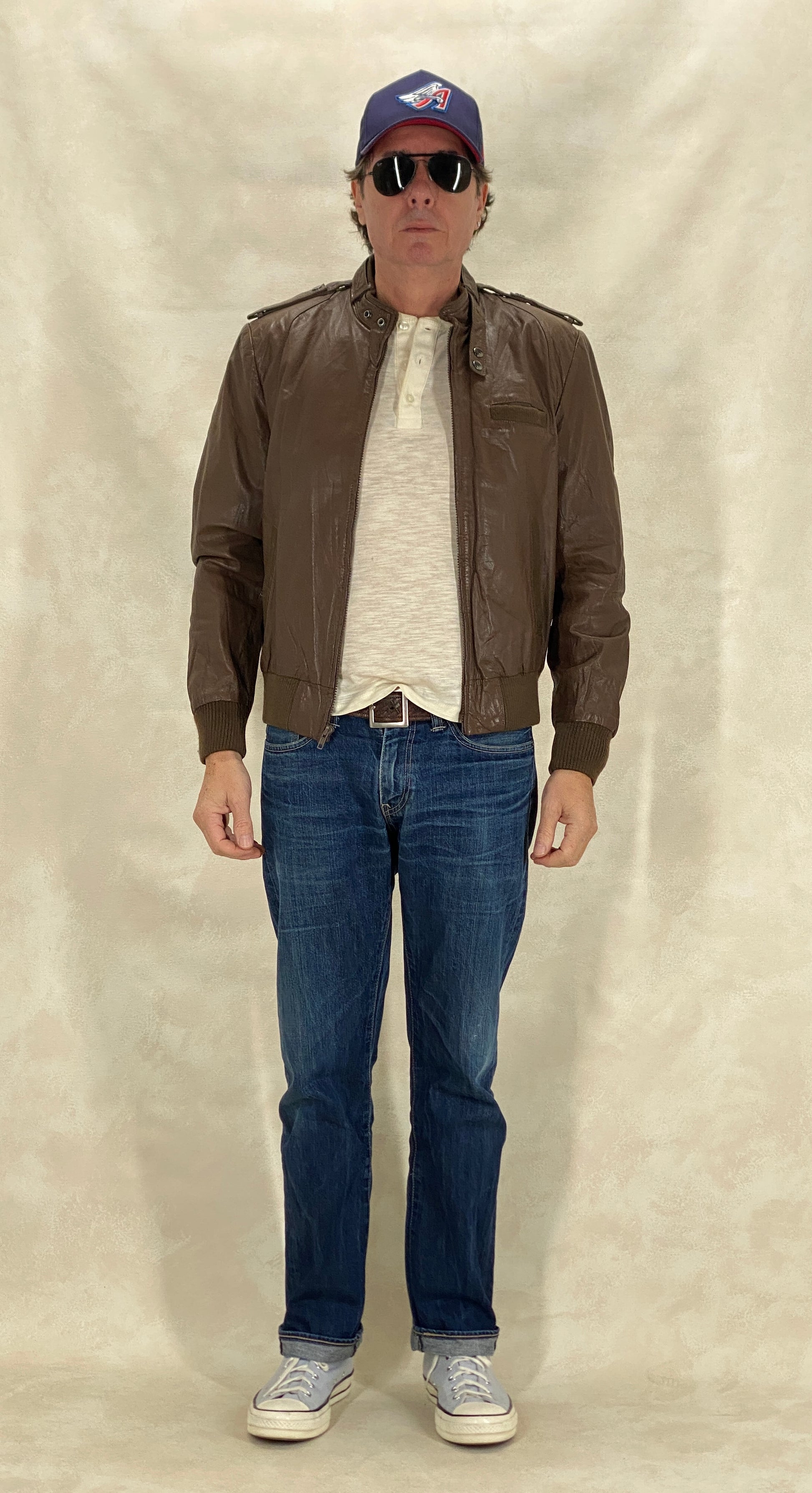 Vintage 1980s leather jacket in classic retro fashion style, size 40US 50EU