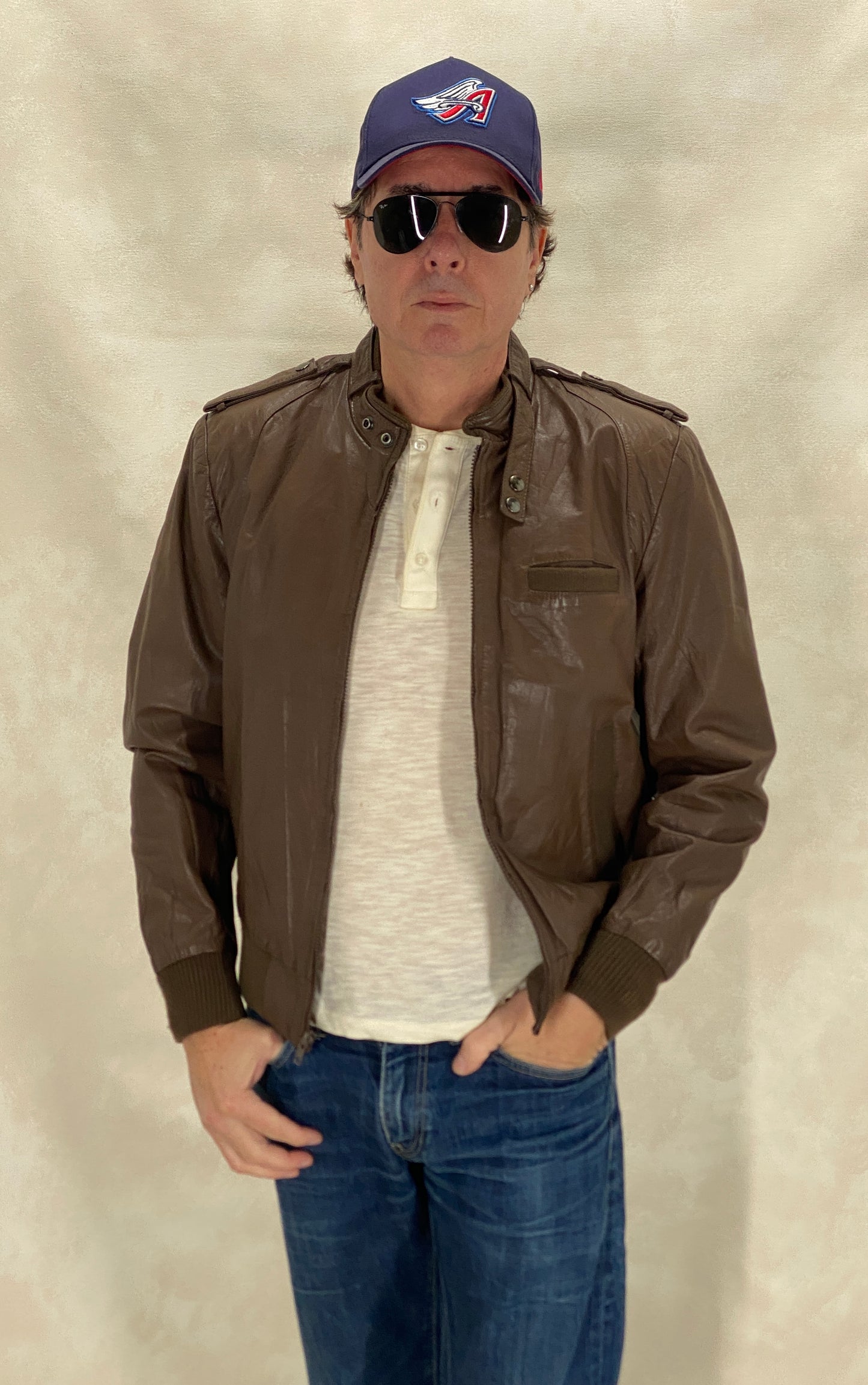 Vintage 1980s leather jacket in classic retro fashion style, size 40US 50EU