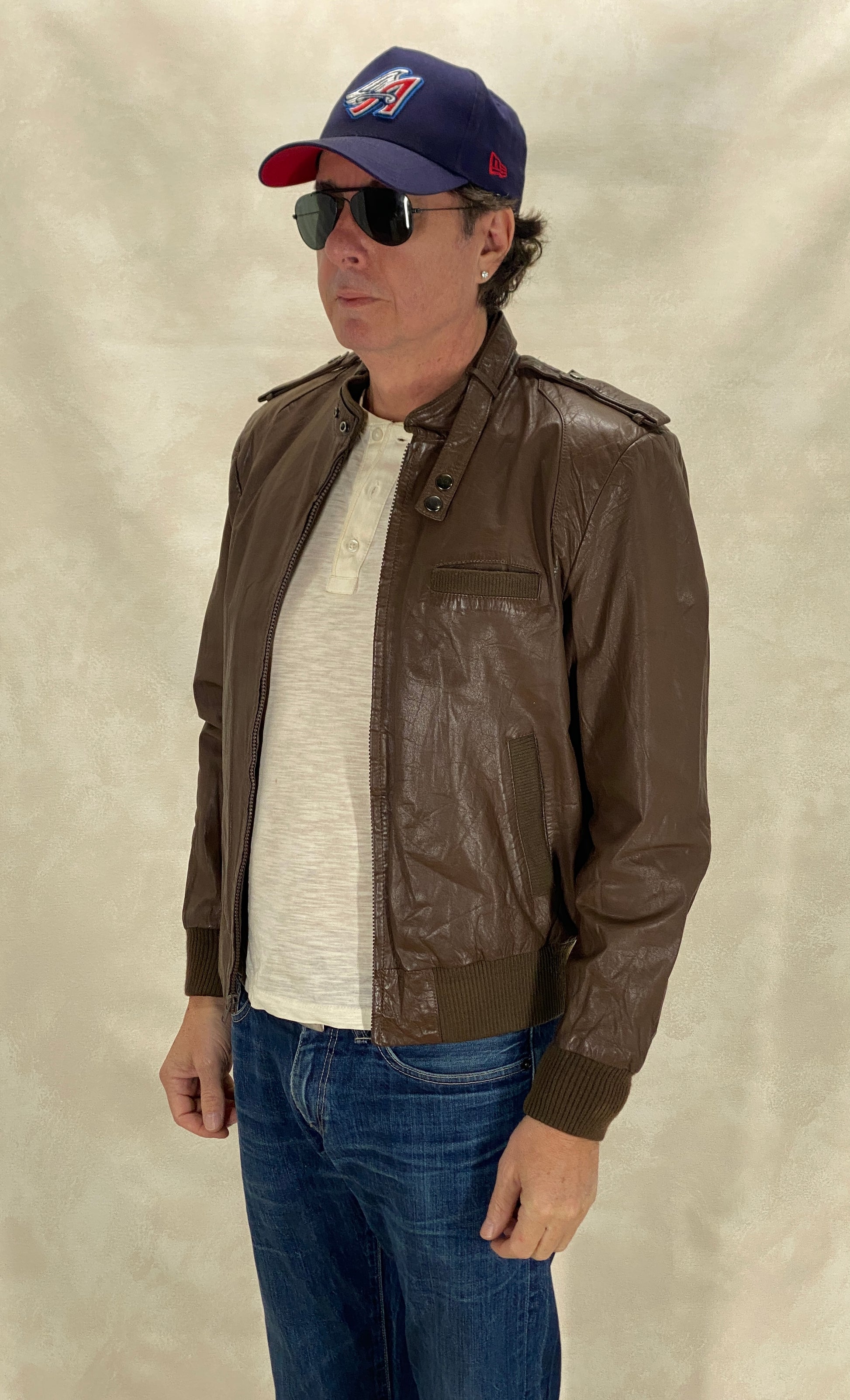 Vintage 1980s leather jacket in classic retro fashion style, size 40US 50EU