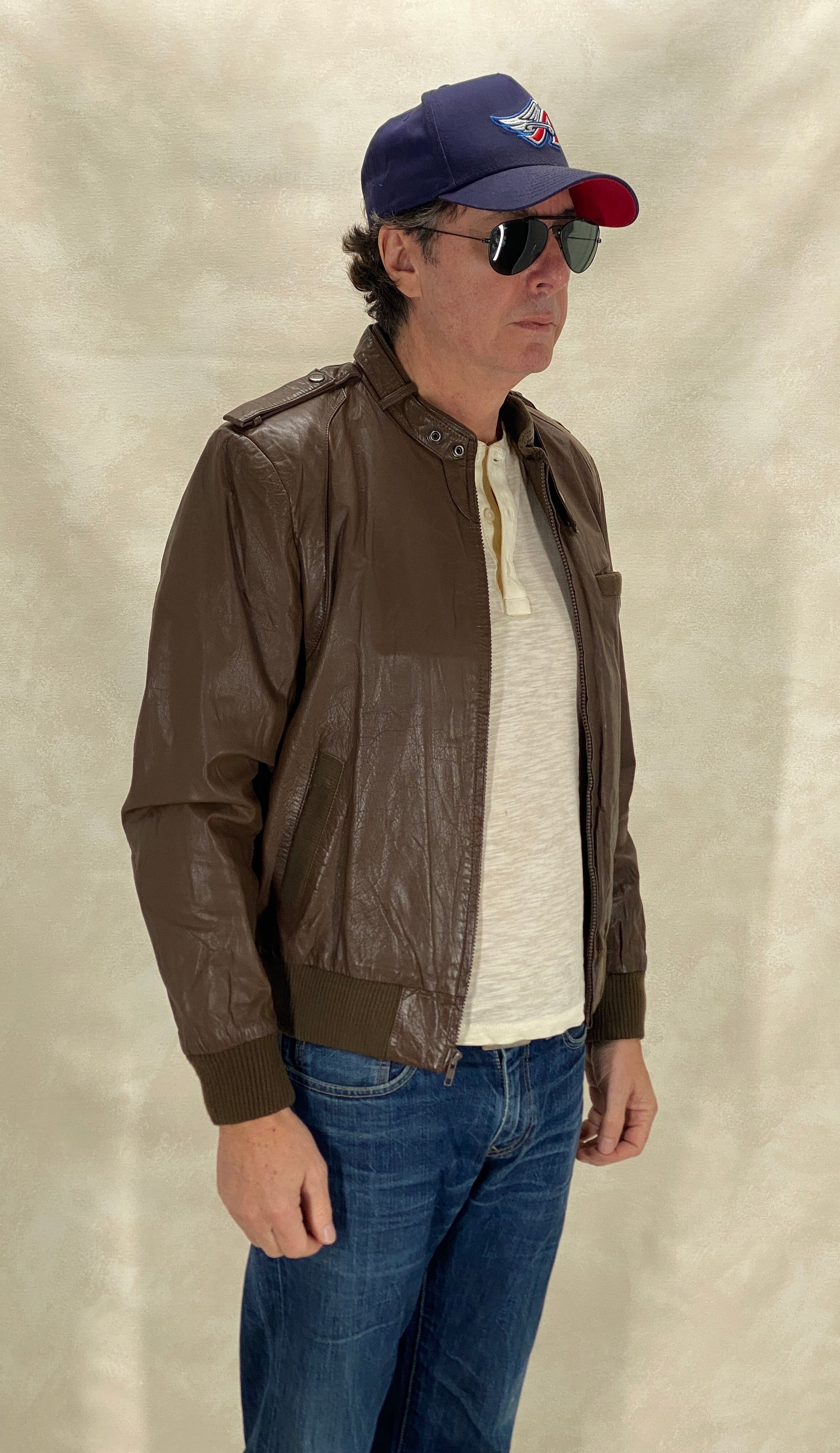Vintage 1980s leather jacket in classic retro fashion style, size 40US 50EU