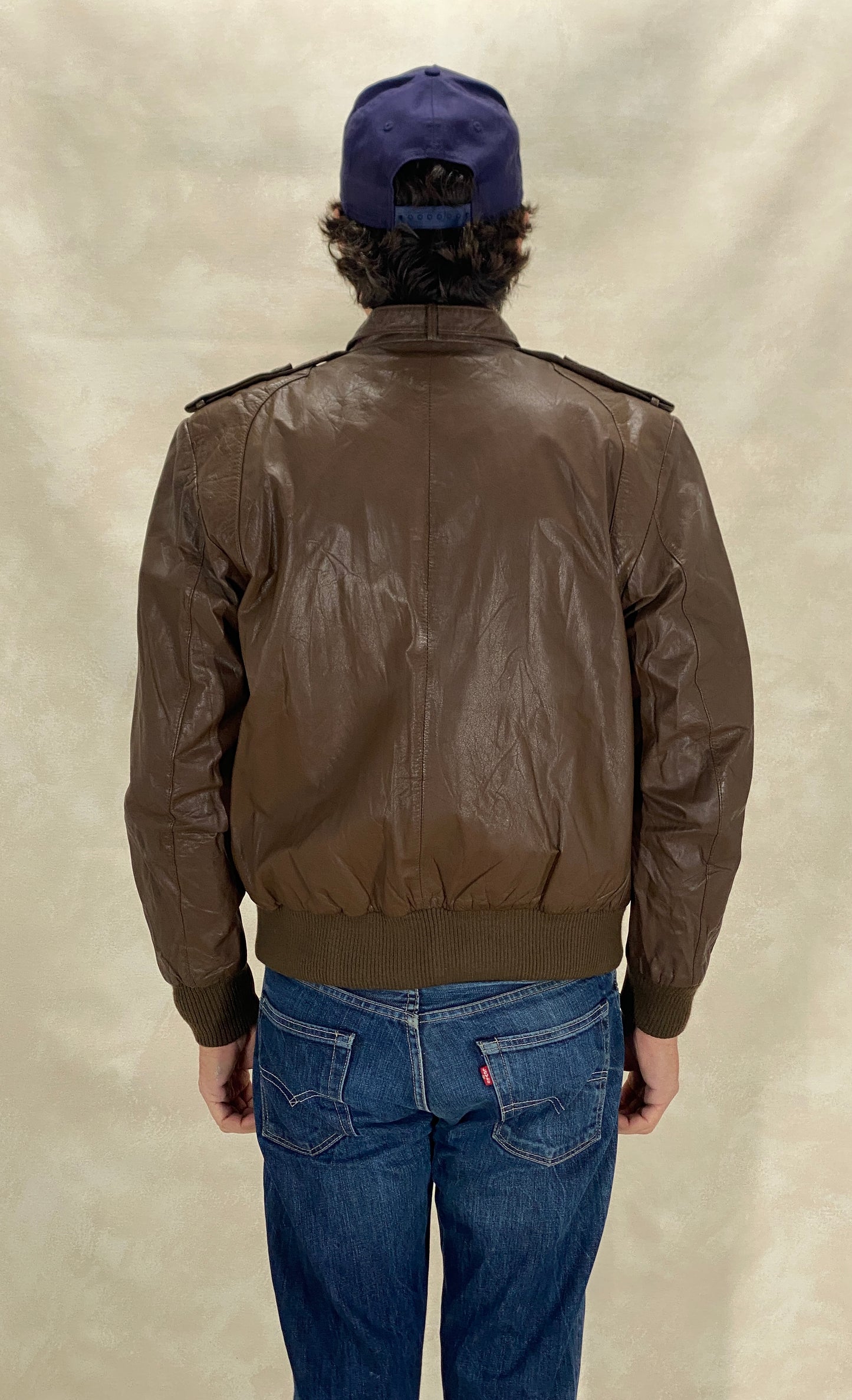 Vintage 1980s leather jacket in classic retro fashion style, size 40US 50EU
