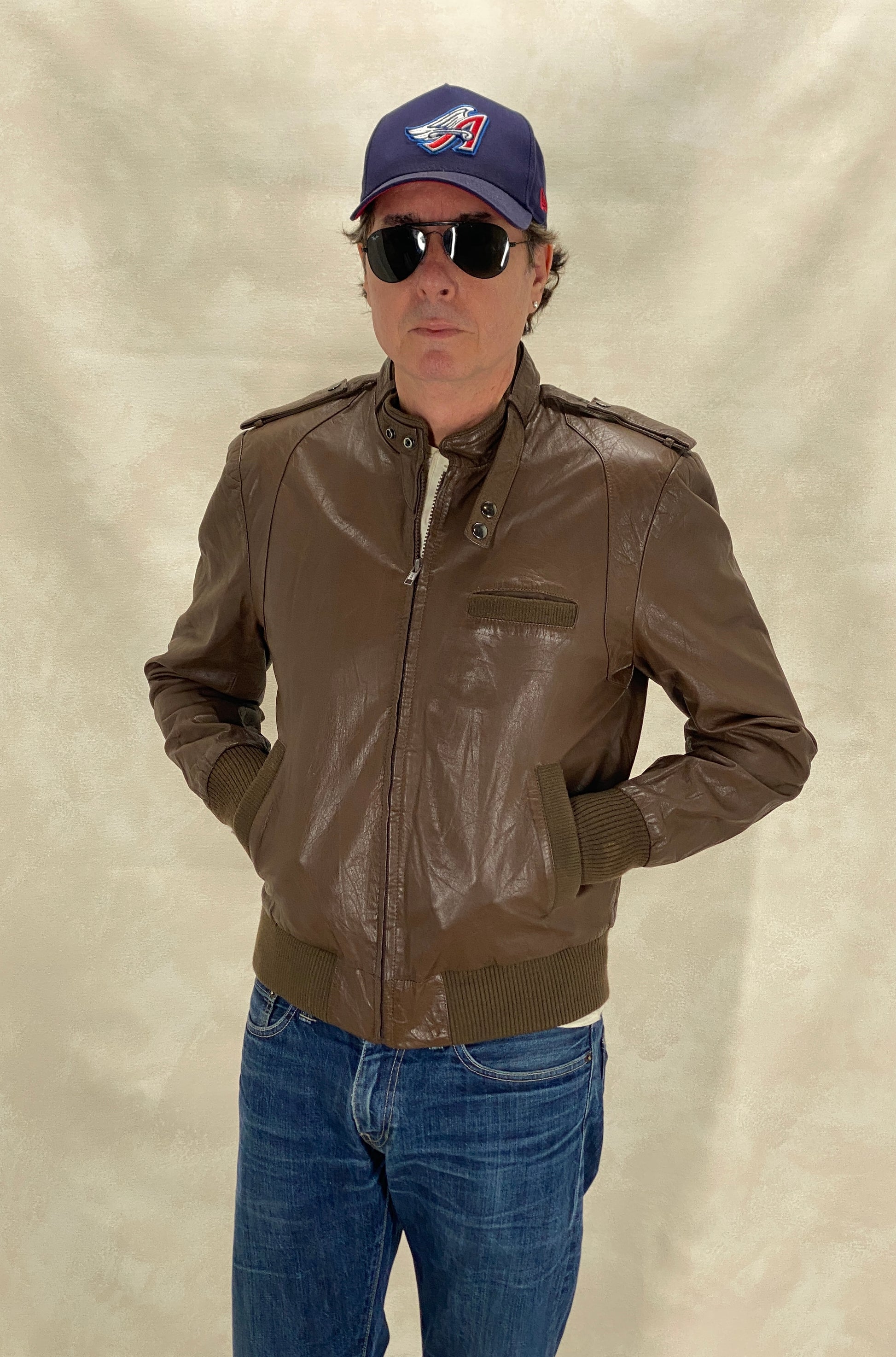 Vintage 1980s leather jacket in classic retro fashion style, size 40US 50EU