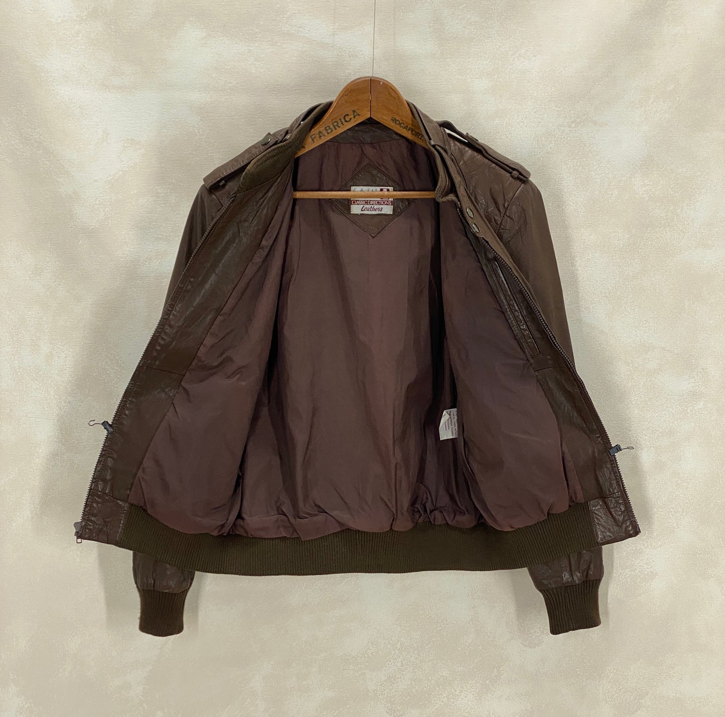 Vintage 1980s leather jacket in classic retro fashion style, size 40US 50EU