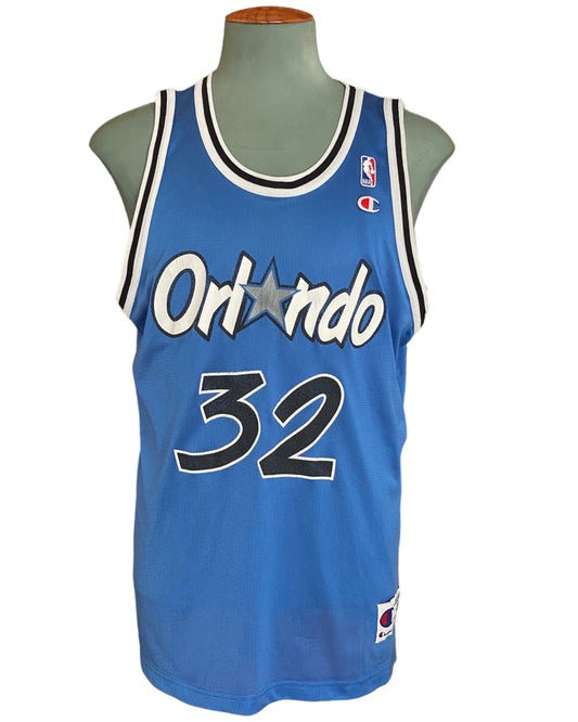  Vintage 90s Orlando NBA jersey with player O'Neal #32, size 48 - front view. Made by Champion.