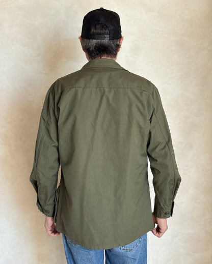 Med Short. Authentic 1970 US Army vintage Vietnam jungle jacket.