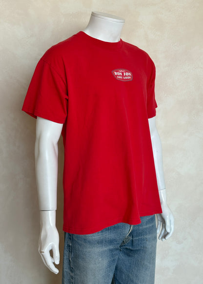 Vintage Ron Jon Surf Shop tee – bold comic-style surfer graphic with pure 90s beach energy. Large-AJ357 Studio