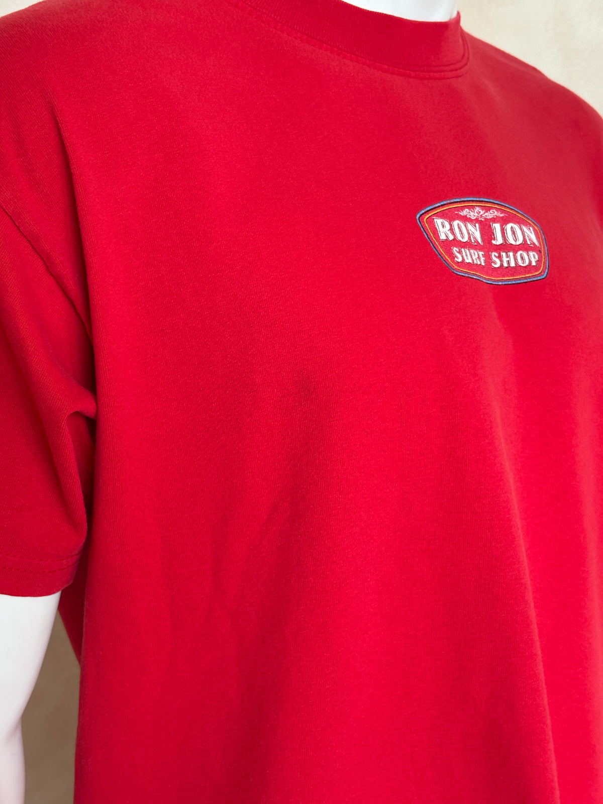 Vintage Ron Jon Surf Shop tee – bold comic-style surfer graphic with pure 90s beach energy. Large-AJ357 Studio