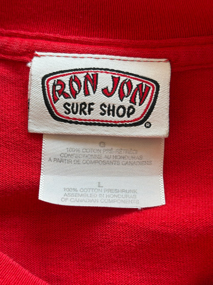 Vintage Ron Jon Surf Shop tee – bold comic-style surfer graphic with pure 90s beach energy. Large-AJ357 Studio