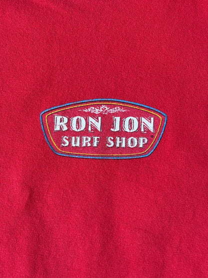 Vintage Ron Jon Surf Shop tee – bold comic-style surfer graphic with pure 90s beach energy. Large-AJ357 Studio