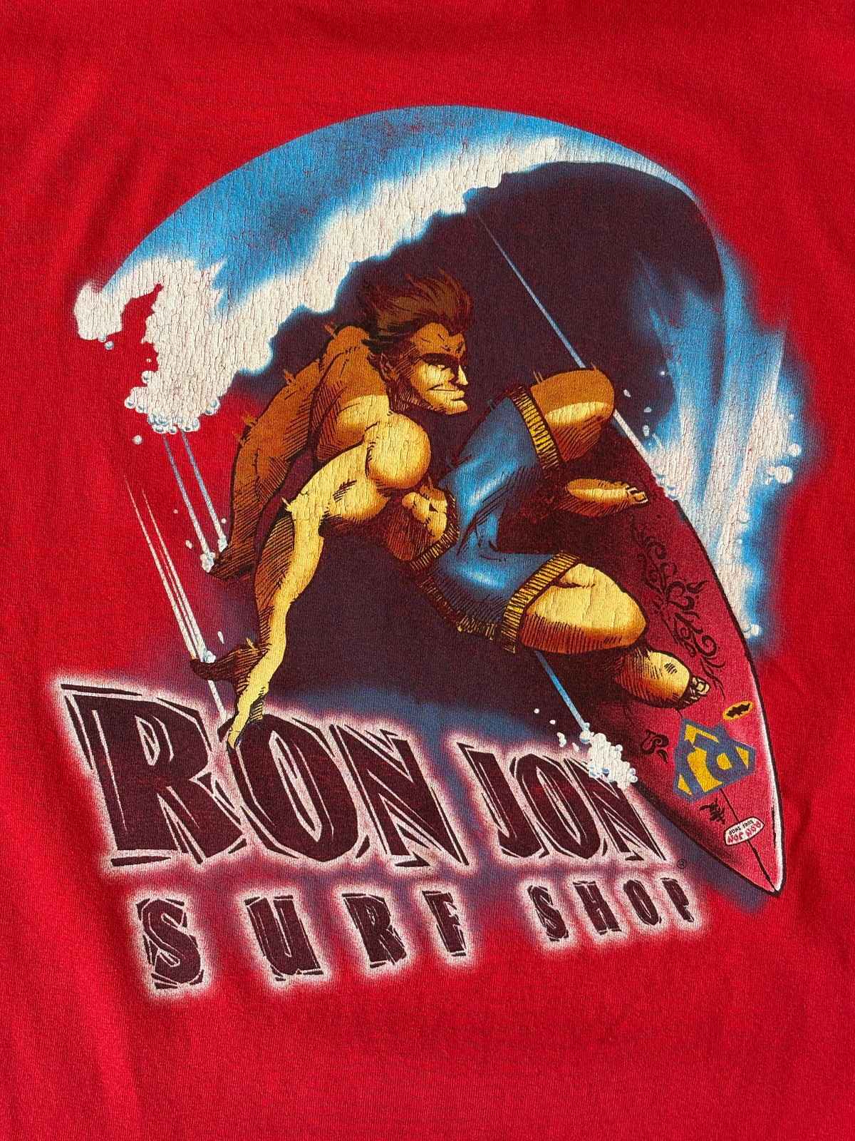 Vintage Ron Jon Surf Shop tee – bold comic-style surfer graphic with pure 90s beach energy. Large-AJ357 Studio