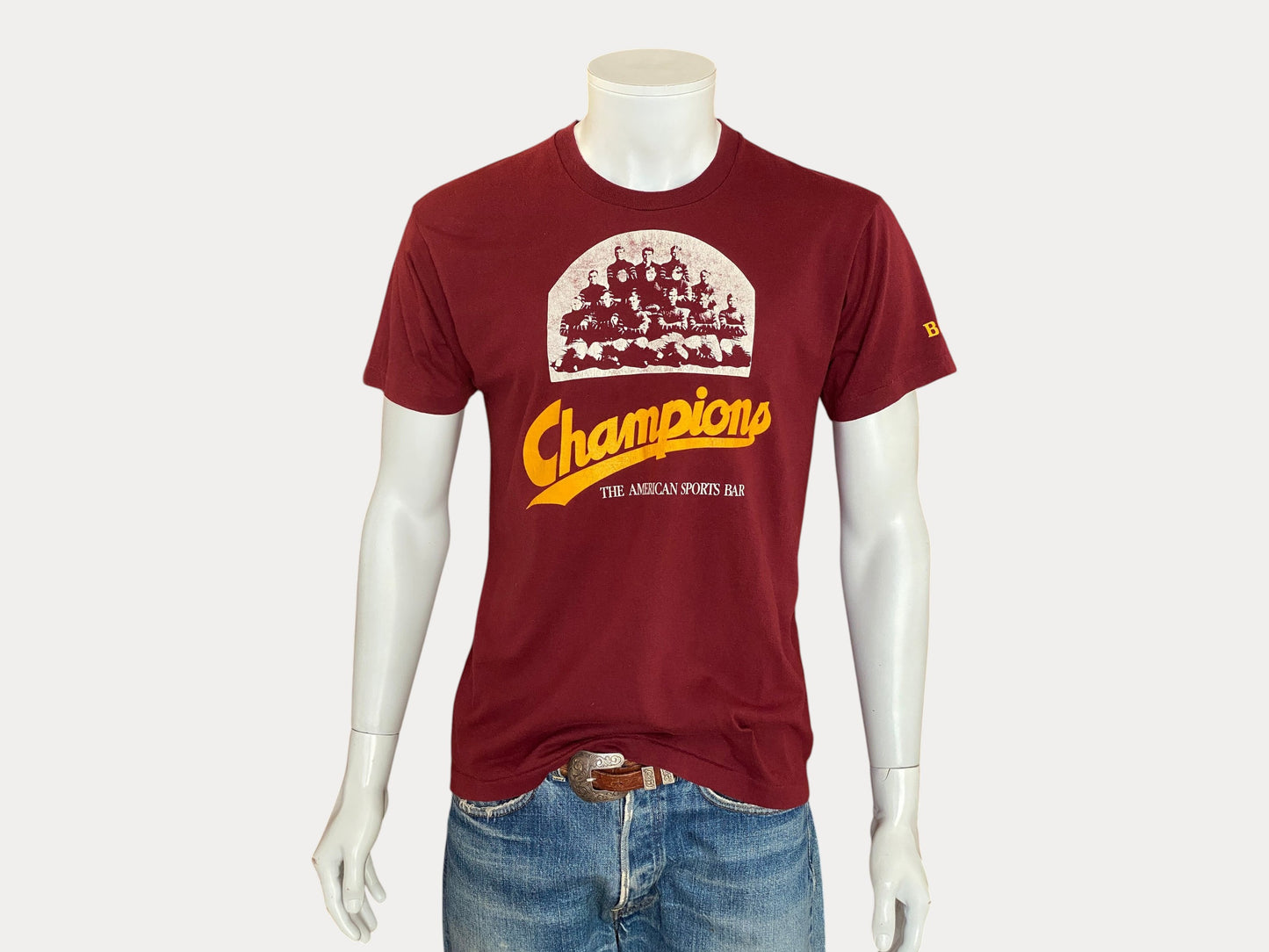 Large. Vintage 50/50 cotton 80s Champions Sports Bar  t shirt Made In USA