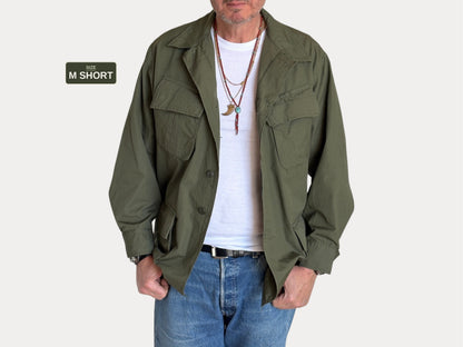 Med Short. Authentic 1970 US Army vintage Vietnam jungle jacket.
