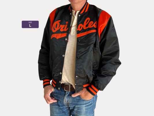 Large.  80s Vintage Orioles Starter jacket Made in USA