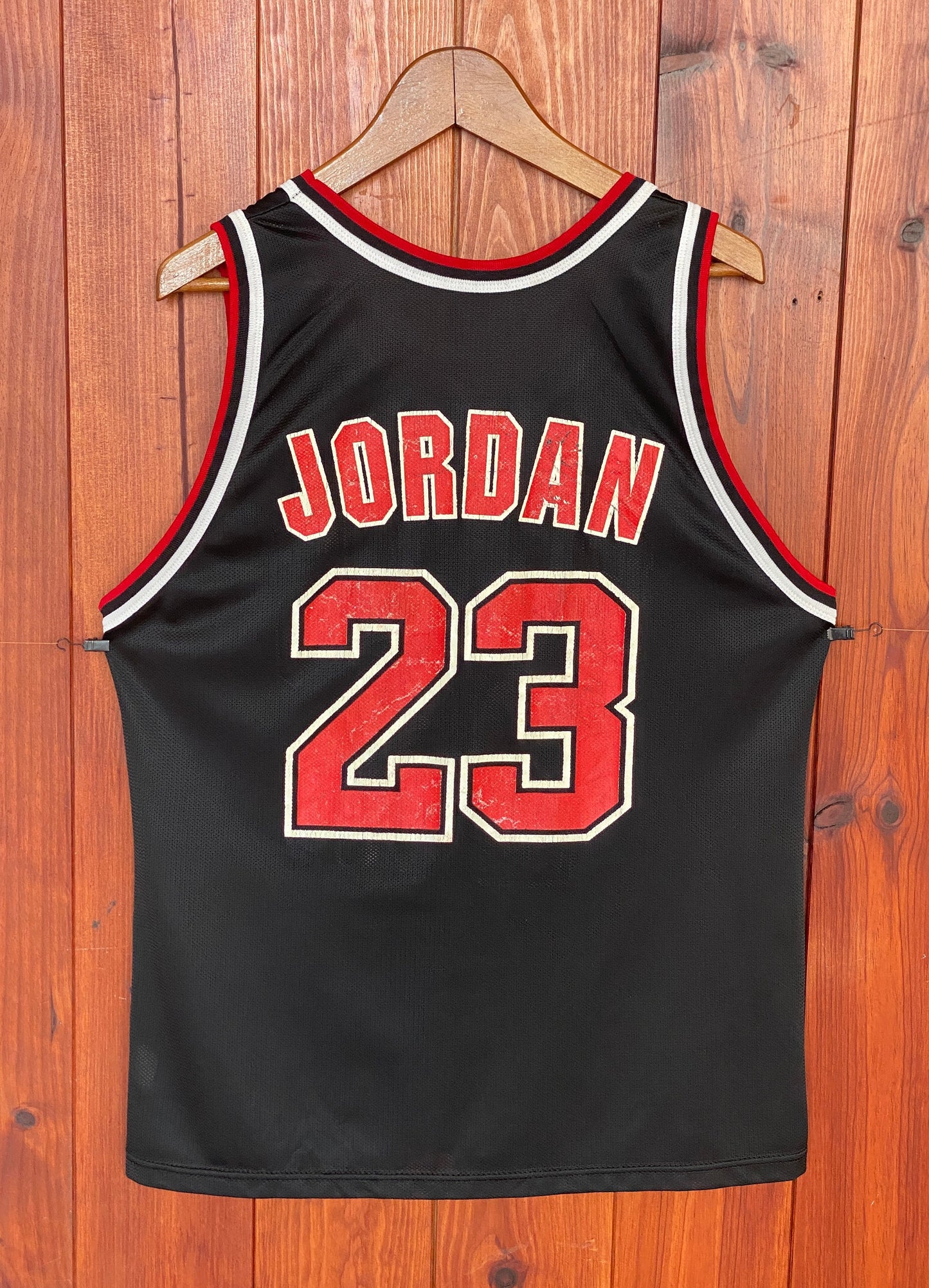Vintage 90s Chicago Bulls Michael Jordan #23 NBA jersey, size 44 - back view.