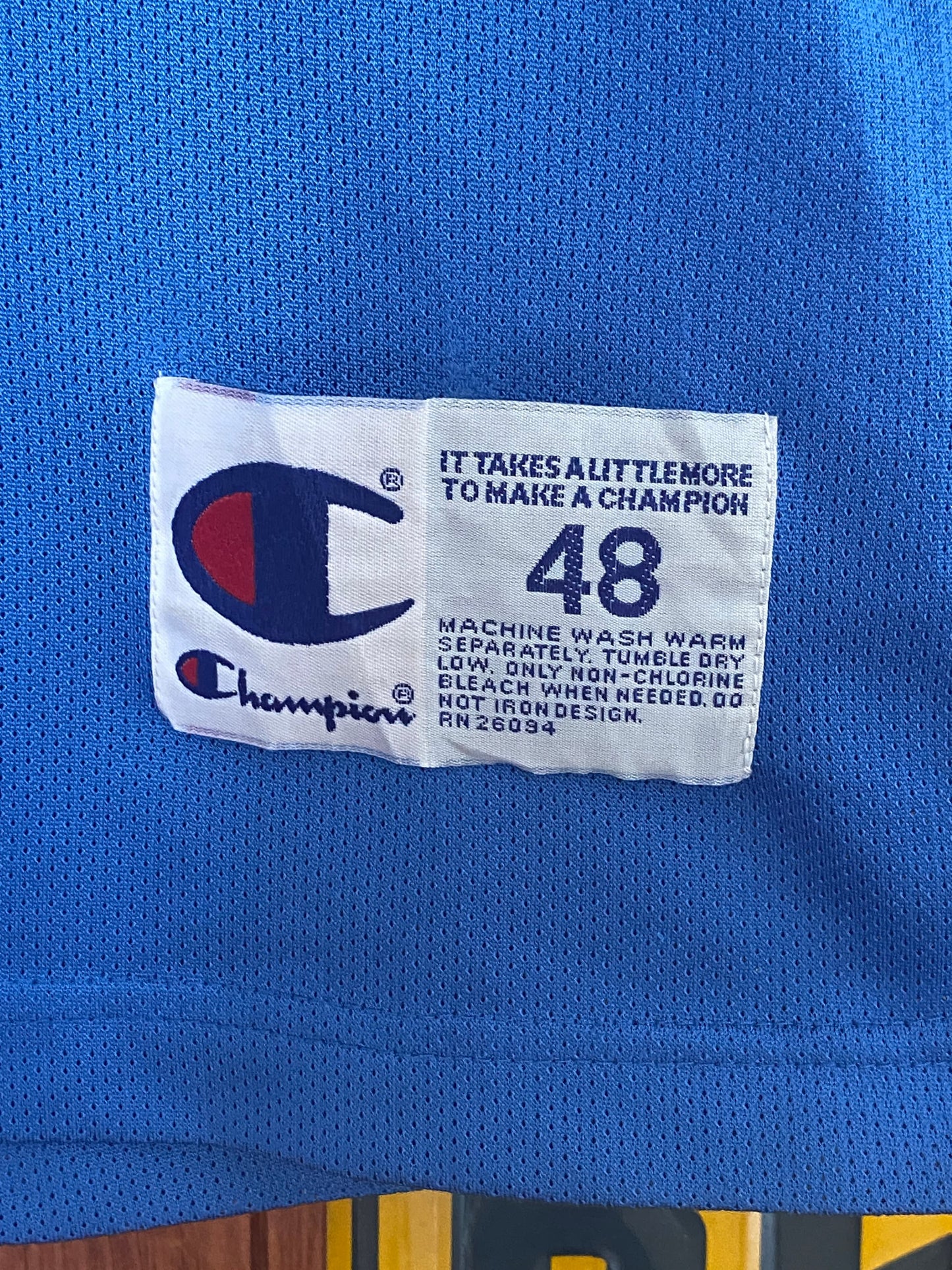 Vintage 90s Orlando NBA jersey with player O'Neal #32, size 48 - front view. Made by Champion.