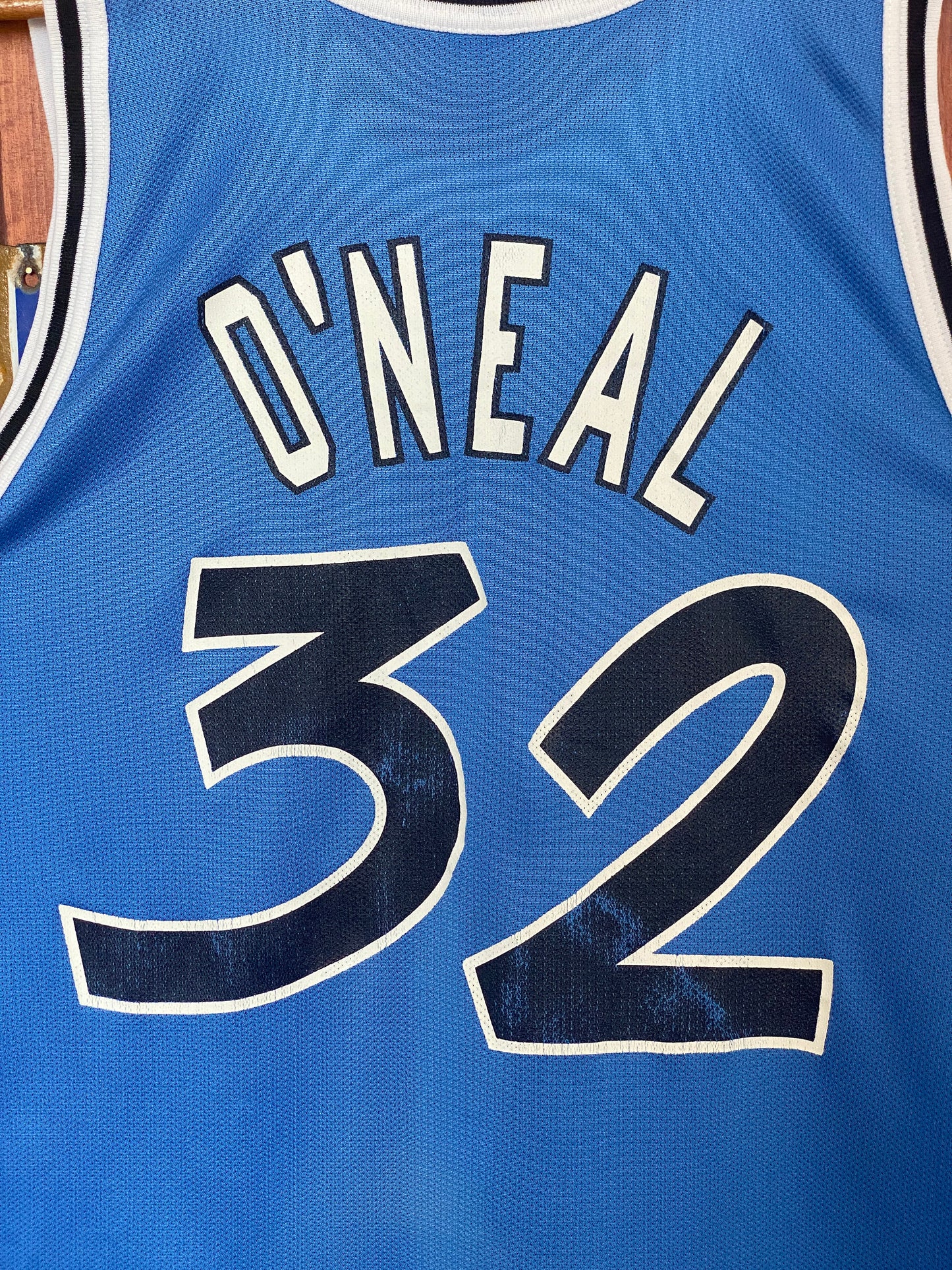  Vintage 90s Orlando NBA jersey with player O'Neal #32, size 48 - front view. Made by Champion.